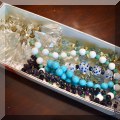 J25. Beaded necklaces. 